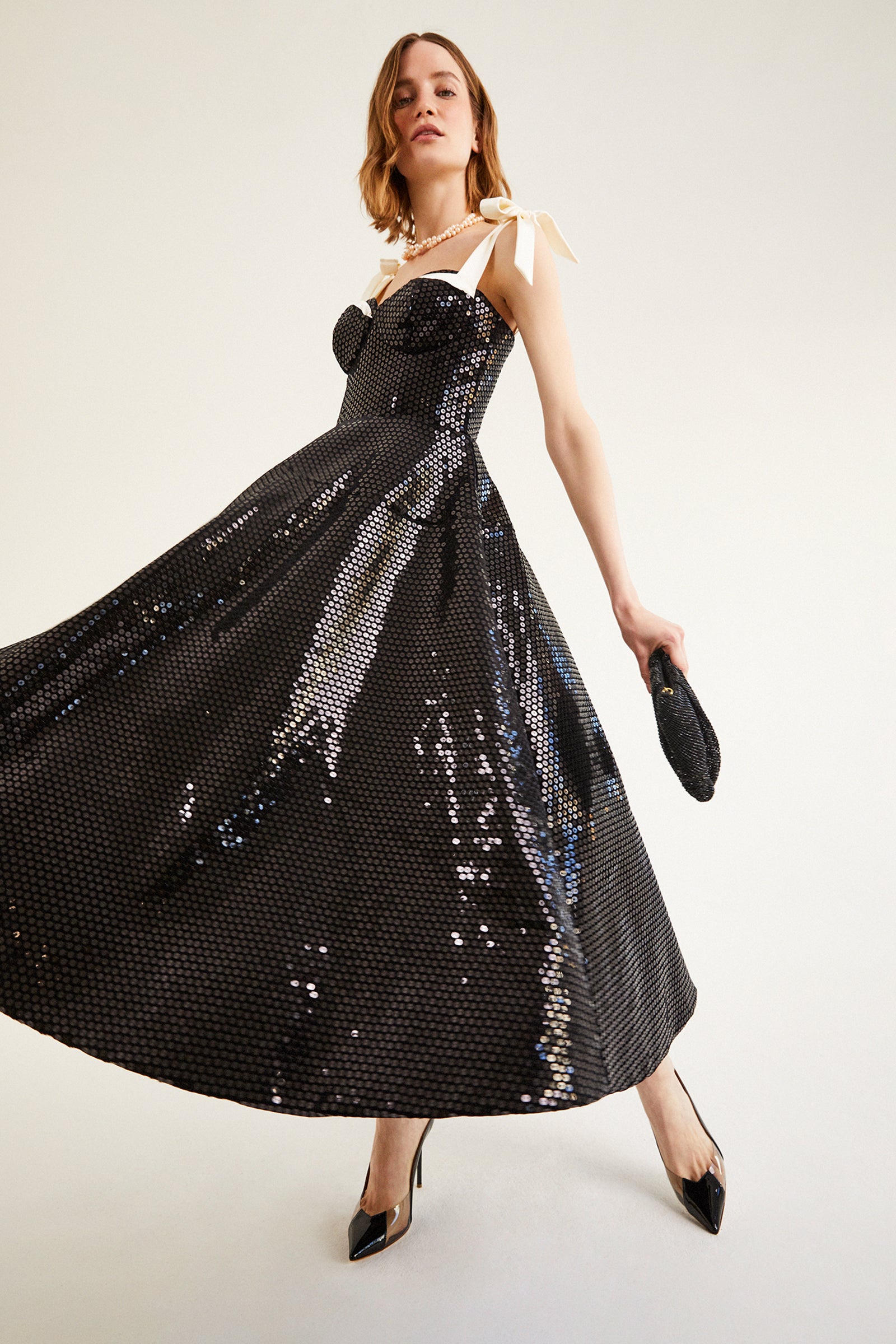 The NIKEETA Black Sequin Corset Back Mermaid Formal Gown
